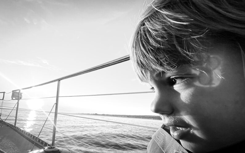 Charlie Lyons first sail Monterey Bay, Father and son sailing sunset photography, Monterey Bay sailboat sunset, First time sailing with toddler, Walt Whitman sail forth deep waters, Family sailing adventure documentation, Three year old first sailboat experience